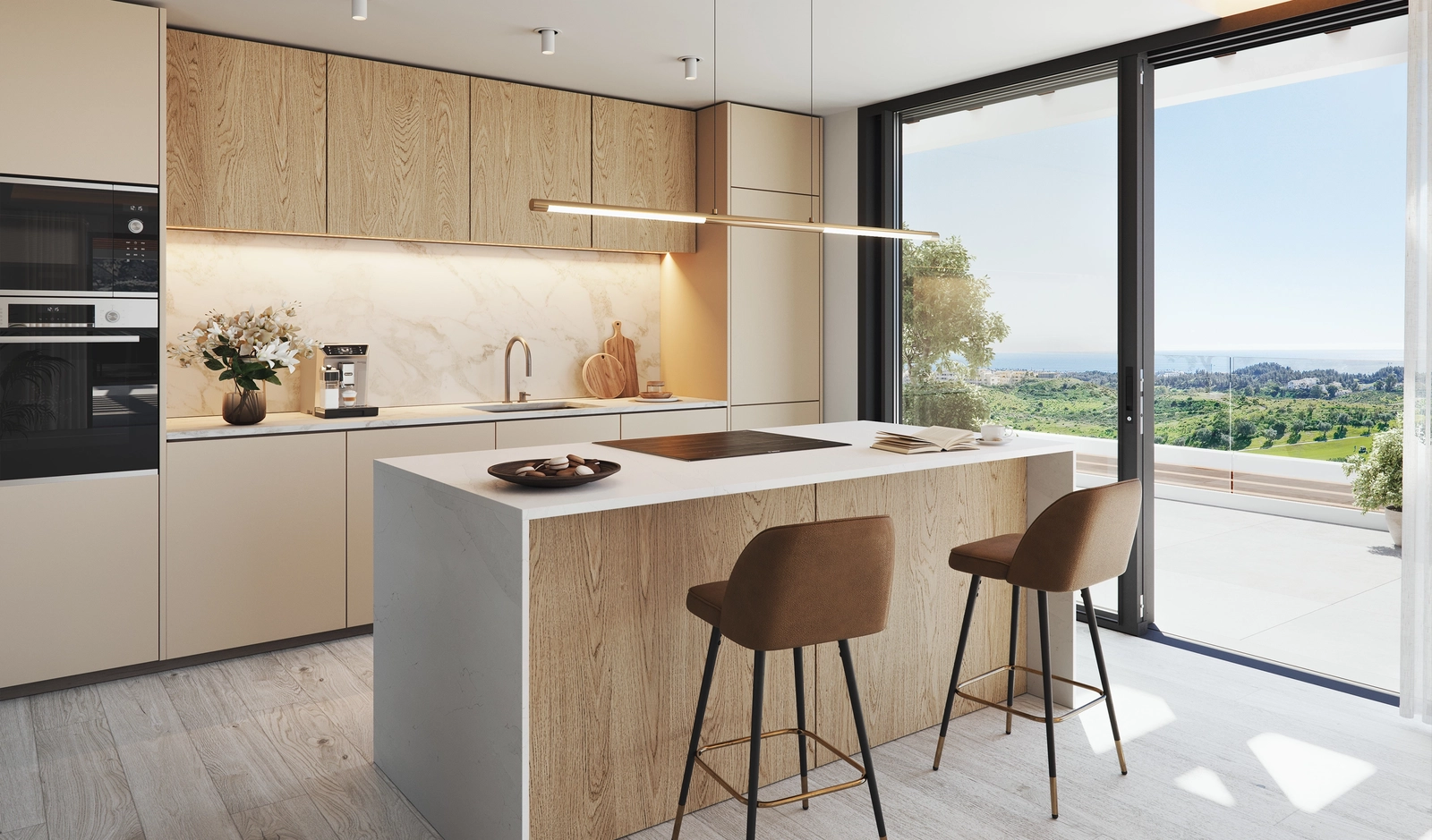 Een moderne keuken met hoogwaardige apparatuur en open uitzicht over Mijas en het omliggende landschap.