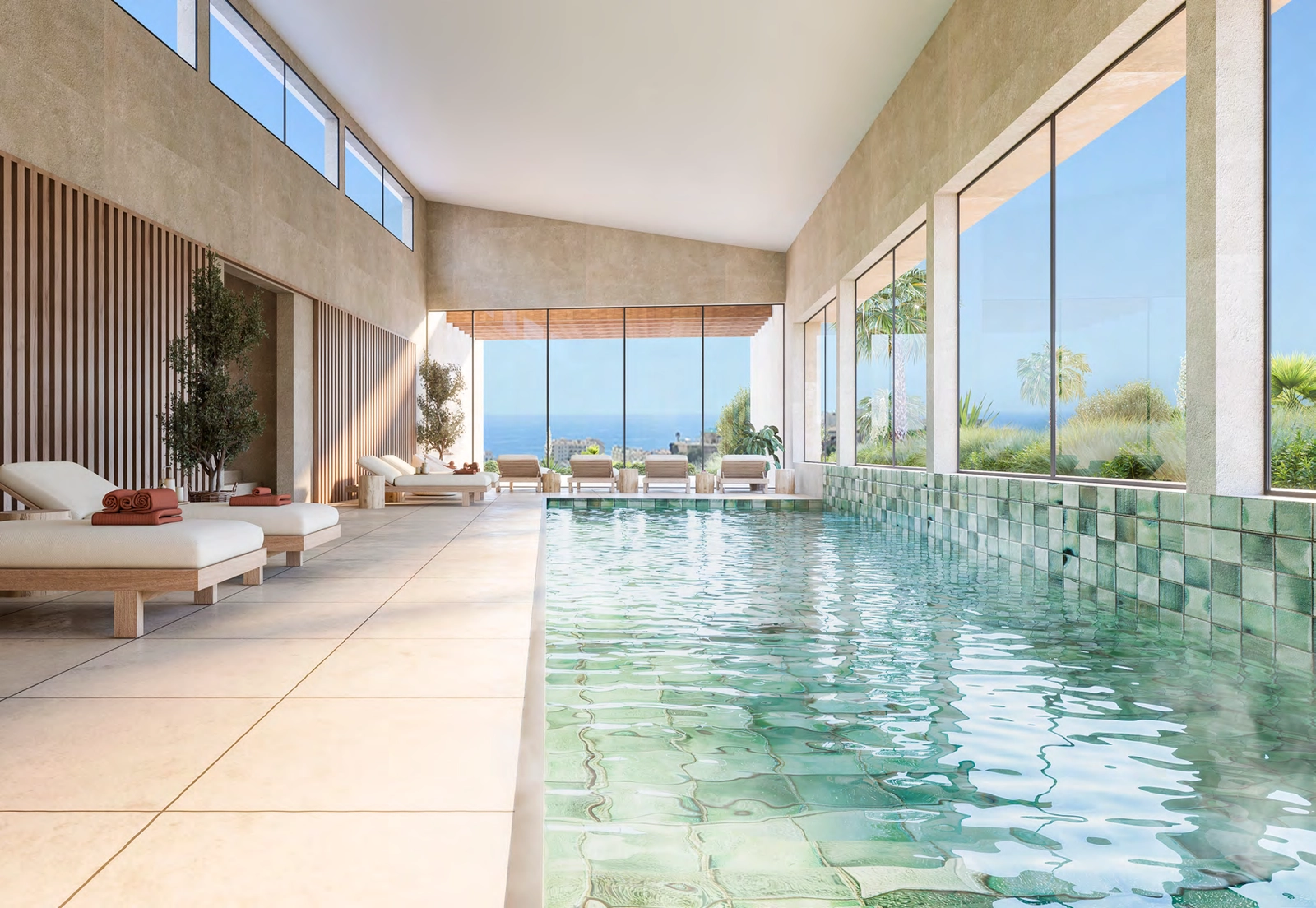 Het exclusieve verwarmde binnenzwembad en de spa, ontworpen voor het hele jaar door ontspanning en welzijn.