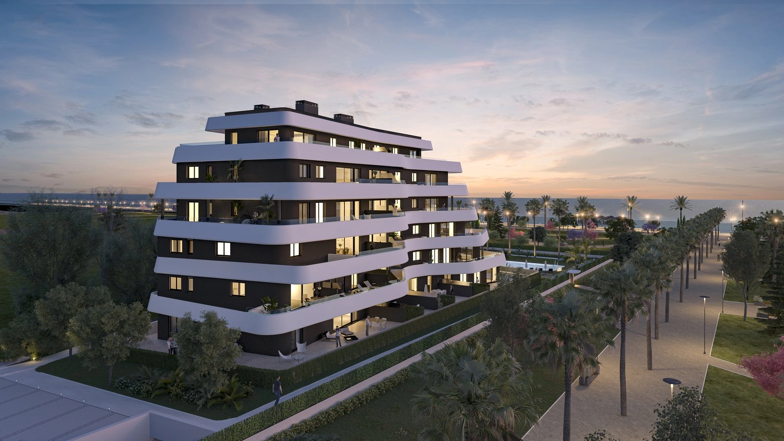 Een avondbeeld van het project, met de moderne architectuur en de nabijheid van de prachtige kustlijn van Torremolinos.