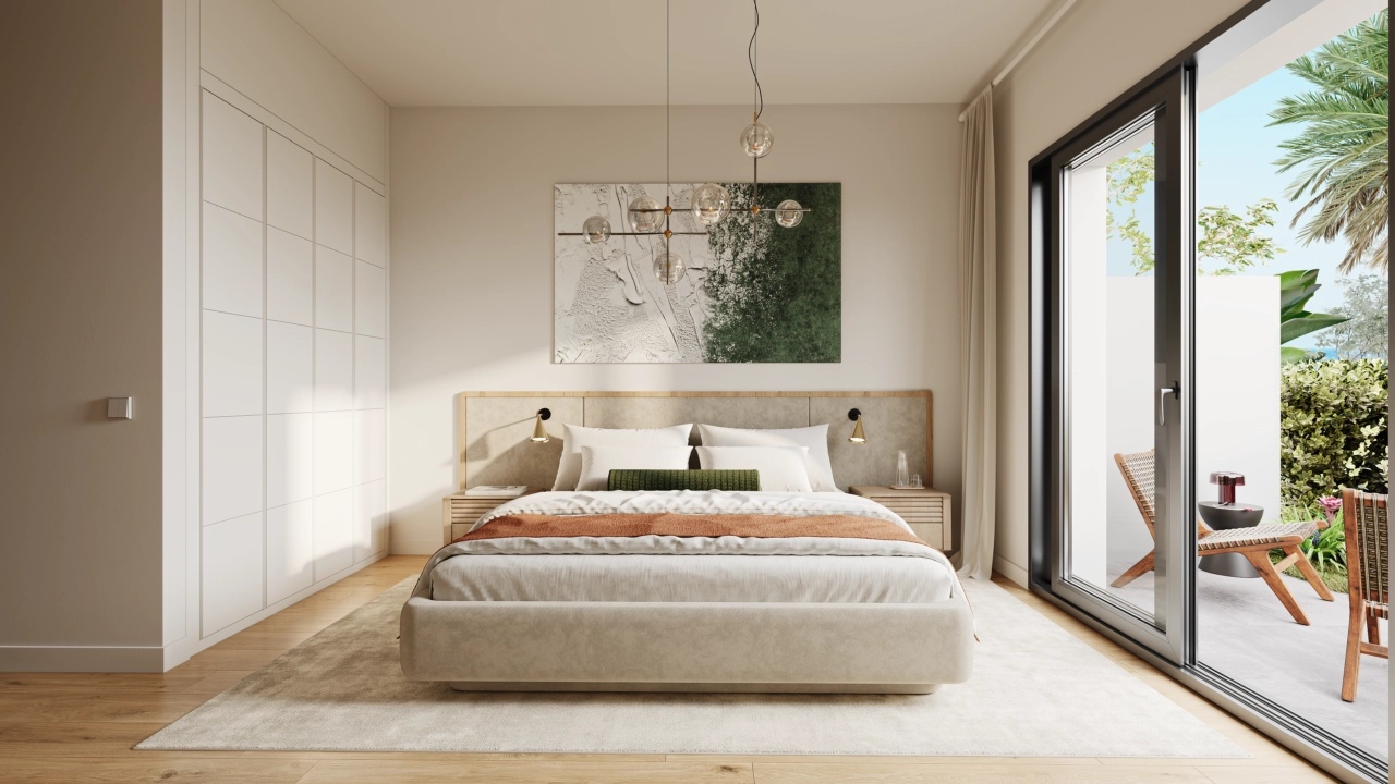 Een rustgevende hoofdslaapkamer, ontworpen voor rust en ontspanning, met directe toegang tot een buitenruimte.