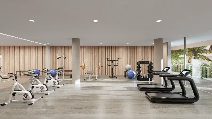De volledig uitgeruste fitnessruimte voor bewoners, ontworpen voor een complete training.