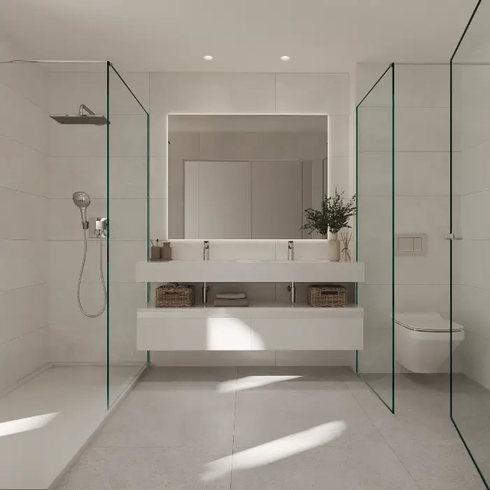 Elegante hoofdbadkamers zijn voorzien van hoogwaardige materialen, een eigentijds design en ruime inloopdouches voor een spa-achtige ervaring.