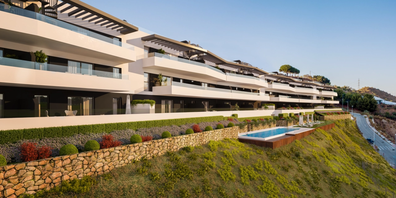 De strakke, moderne architectuur van het project bij zonsondergang.