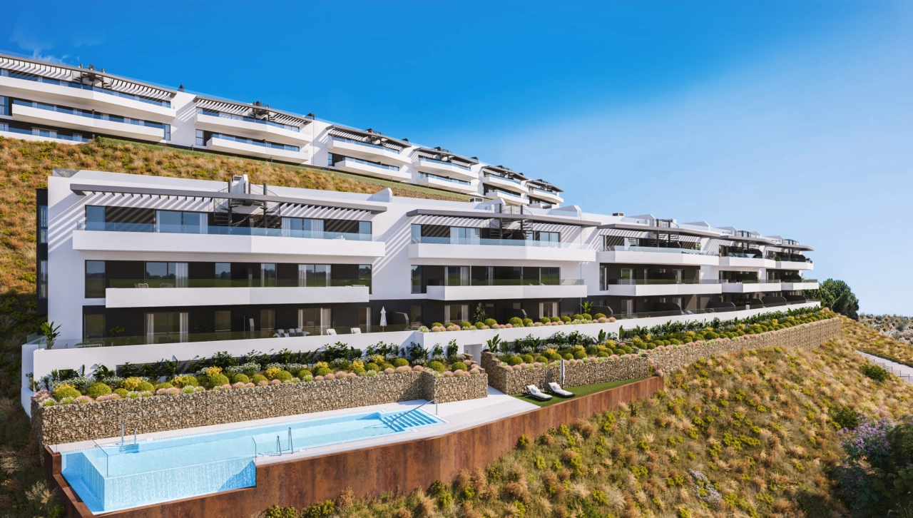 Een uitzicht op het stijlvolle appartementencomplex, ontworpen om op te gaan in het natuurlijke landschap.