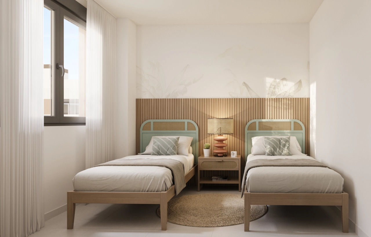 Comfortabele en lichte secundaire slaapkamers, perfect voor familie, gasten of als thuiskantoor.