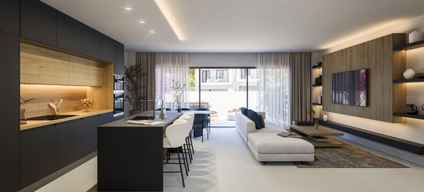 De open leefruimte combineert de keuken, eetkamer en zithoek voor naadloos, modern wonen.