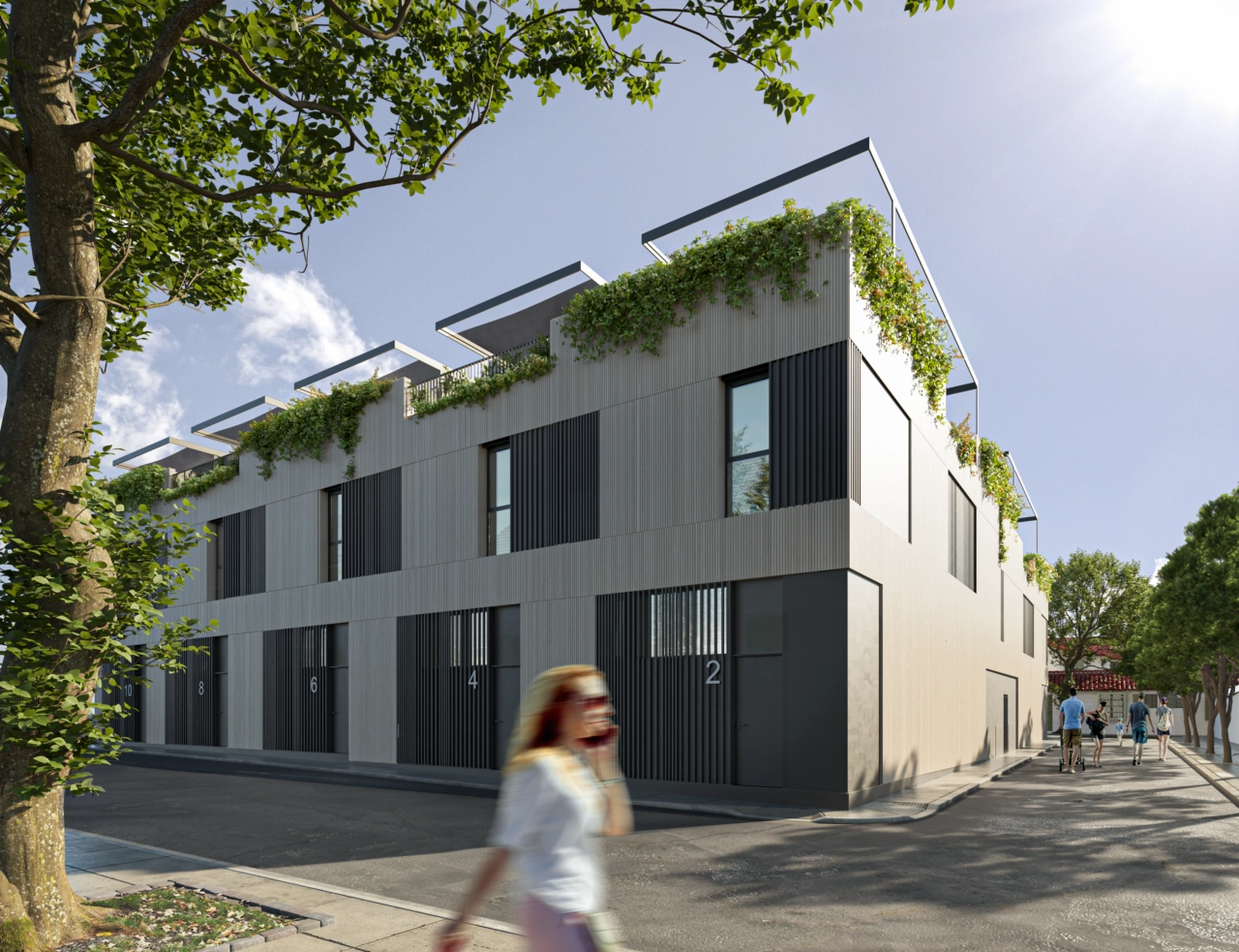 De strakke lijnen en moderne gevel van dit exclusieve woonproject in Pedregalejo.