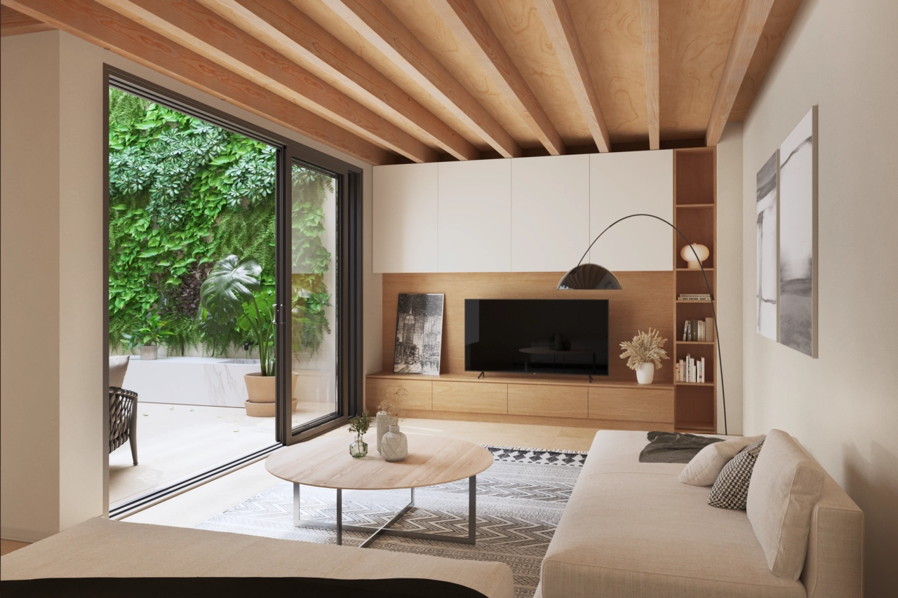 Een stijlvolle woonkamer kijkt uit op de serene binnenpatio met een groene wand.