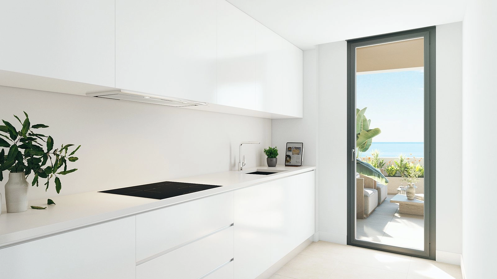 Een lichte, moderne keuken uitgerust met hoogwaardige apparatuur, die uitkomt op het terras voor een binnen-buiten levensstijl.