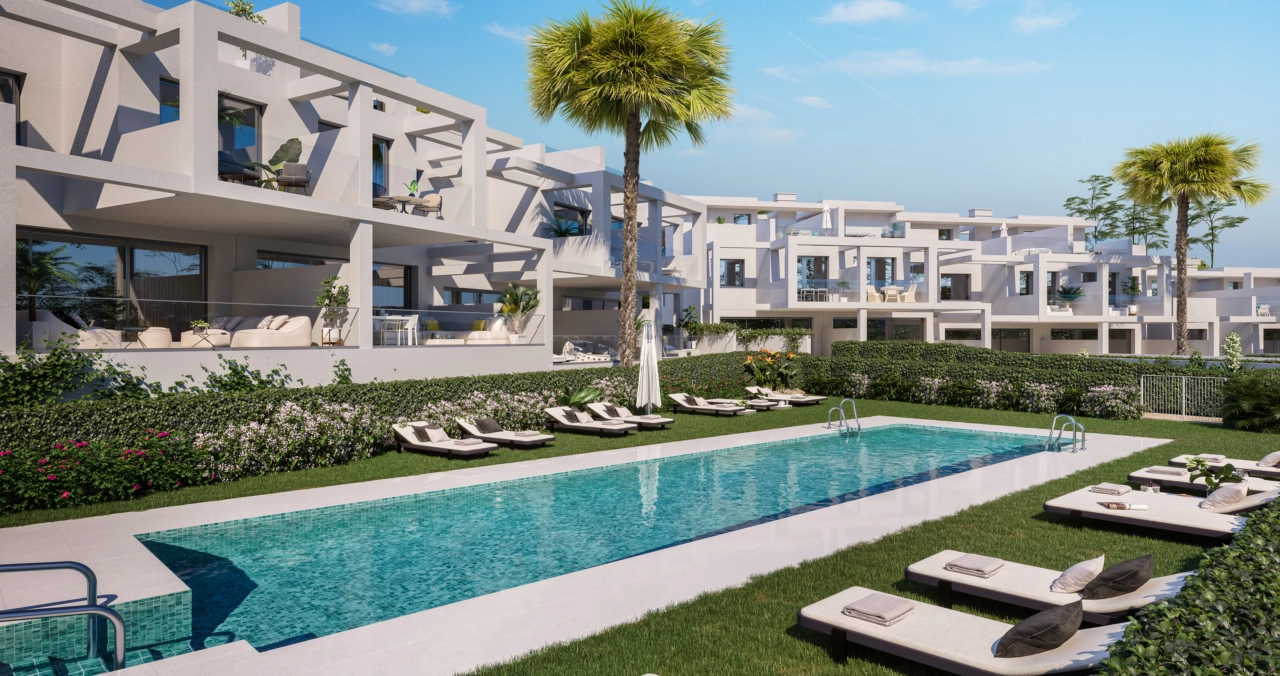 De prachtig aangelegde gemeenschappelijke tuinen en het grote zwembad bieden een heerlijke ruimte voor bewoners om te ontspannen.