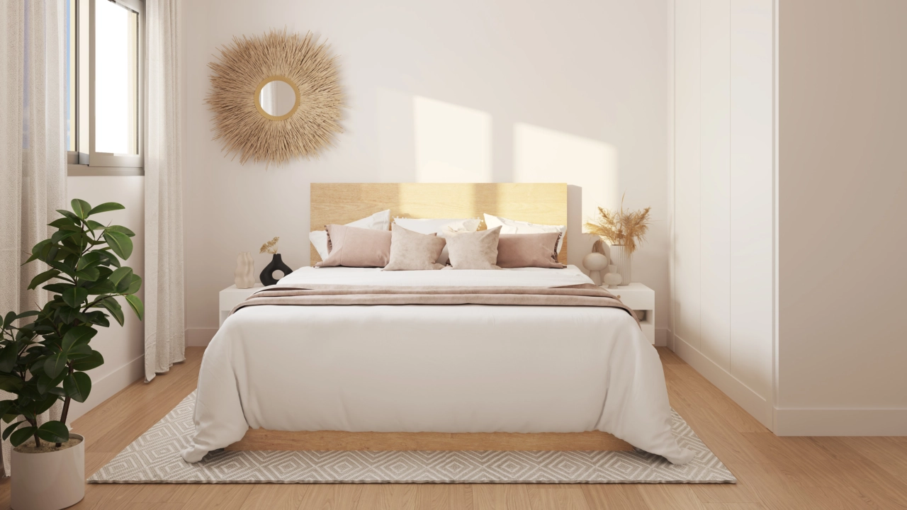 De hoofdslaapkamer biedt een rustig toevluchtsoord, ontworpen met comfort en elegantie in gedachten.