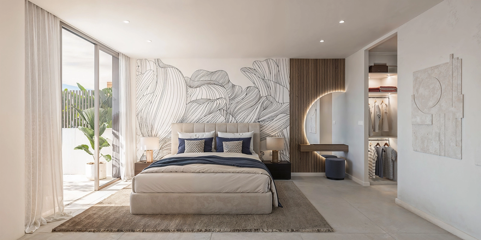 De elegante hoofdslaapkamer biedt een privéretraite met directe toegang tot buiten en een inloopkast.