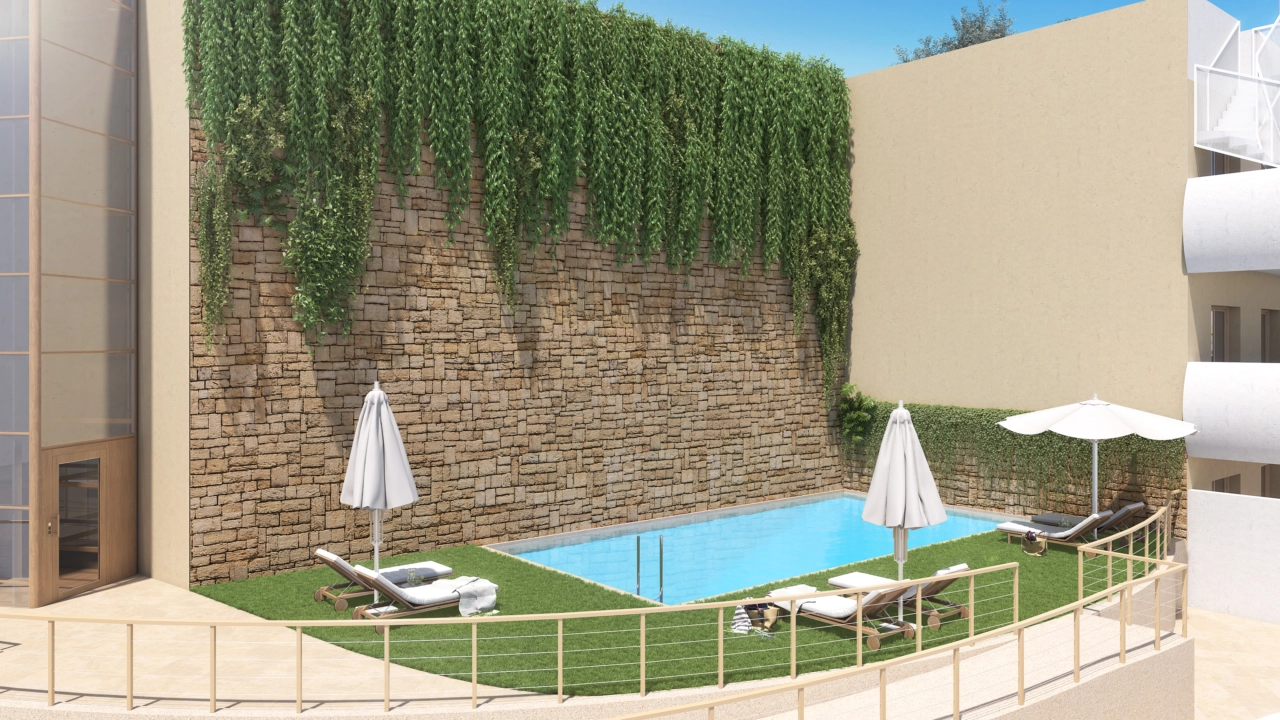 Een van de twee uitnodigende buitenzwembaden, gelegen in prachtig aangelegde gemeenschappelijke tuinen.