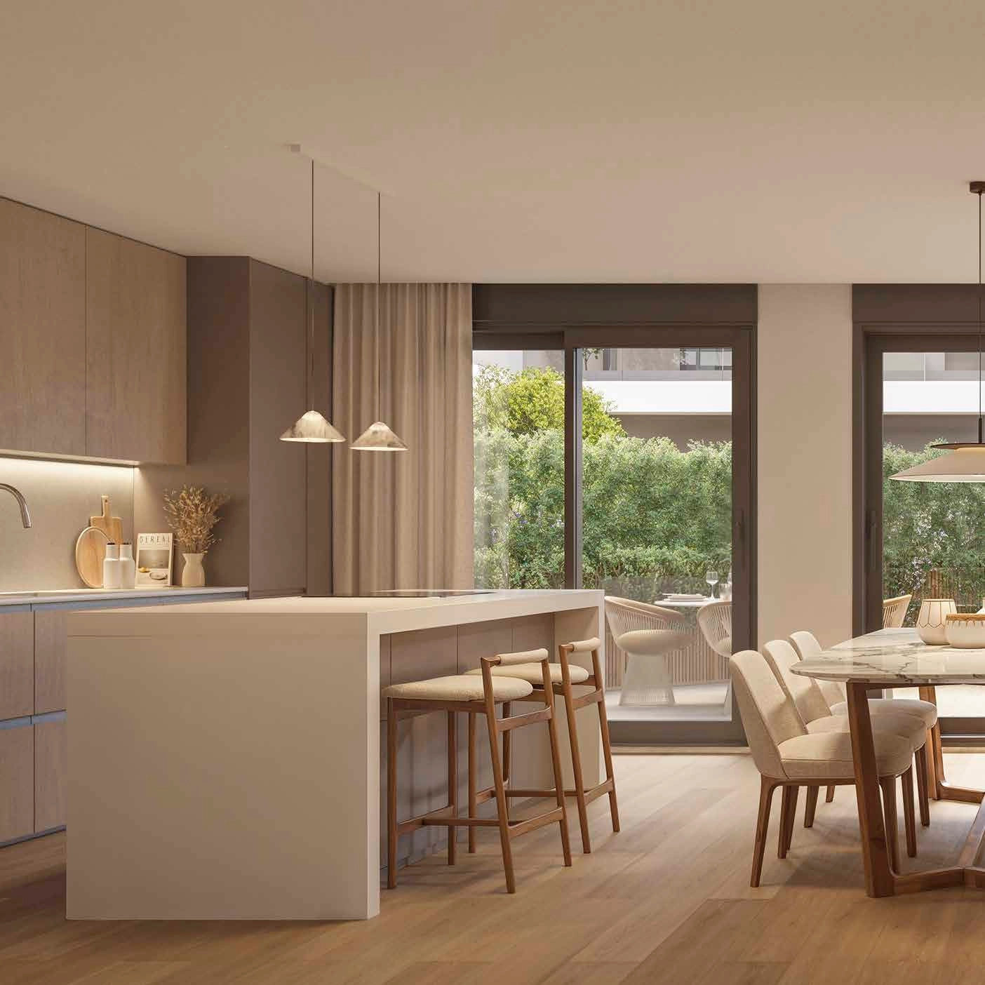 Een moderne, hoogwaardige keuken die uitkomt op de eethoek, perfect voor het ontvangen van gasten.