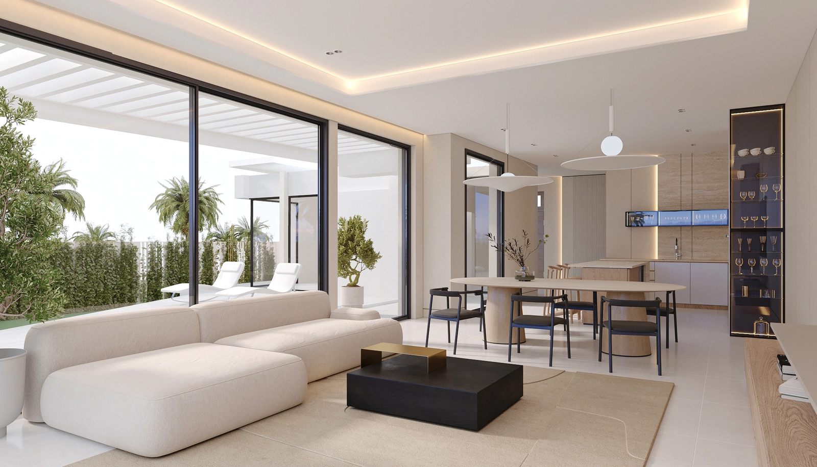 De lichte, open woon- en eetkamer sluit naadloos aan op het buitenterras.