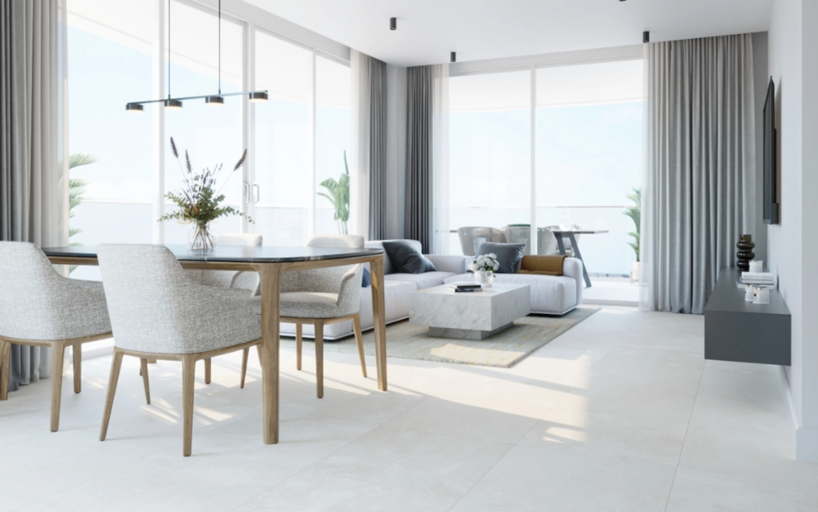 Een ruime en lichte woon- en eetkamer, ontworpen voor comfort en elegantie.