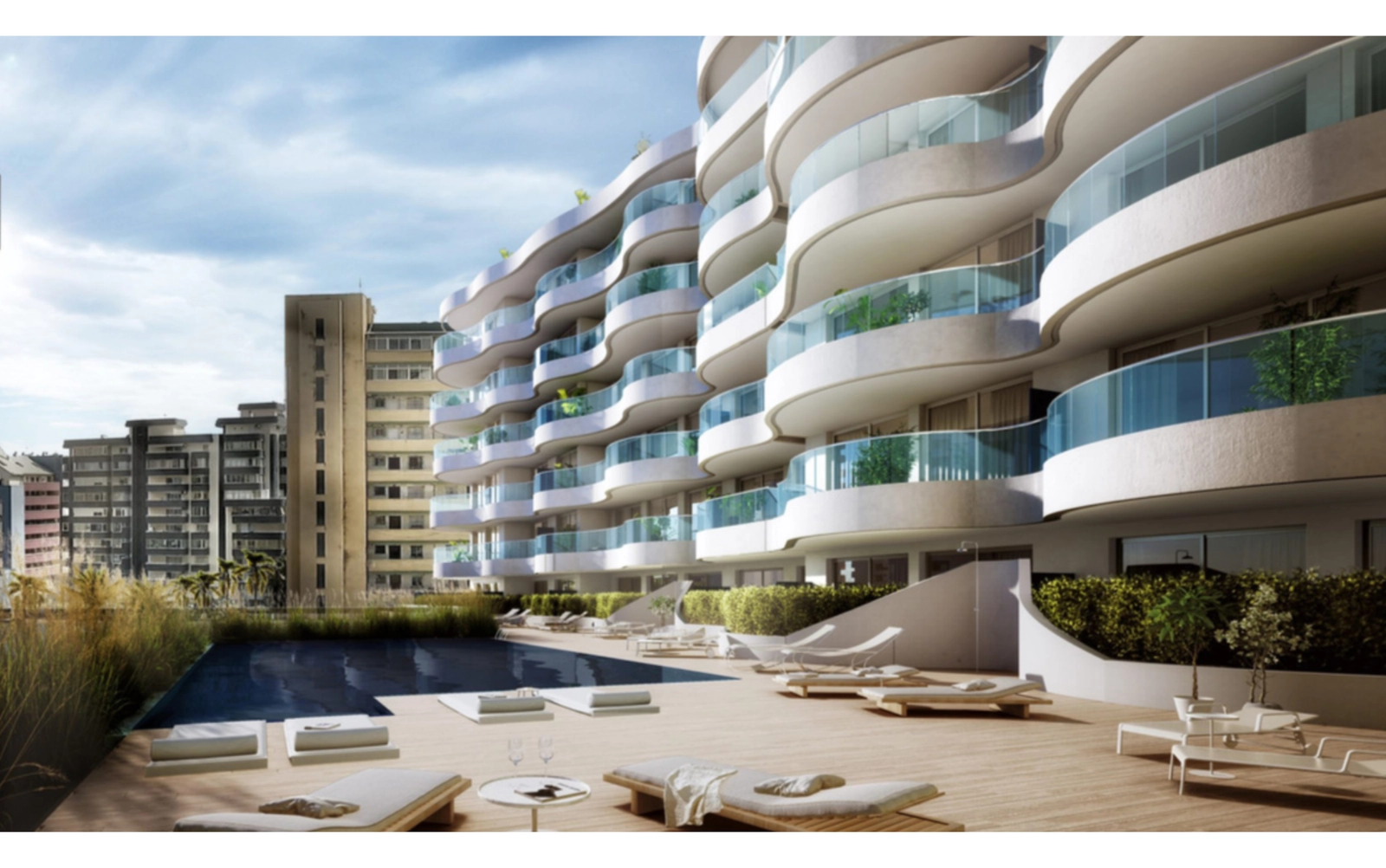 Het gemeenschappelijke zwembad en zonnedek, een perfecte plek om te ontspannen en te genieten van de zon van de Costa del Sol.