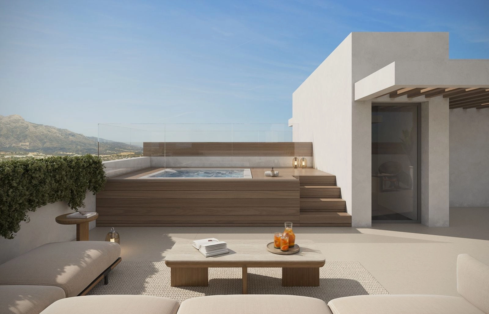 Uw privé dakterras met solarium, een ideale plek om te ontspannen in de jacuzzi met uitzicht op de bergen.