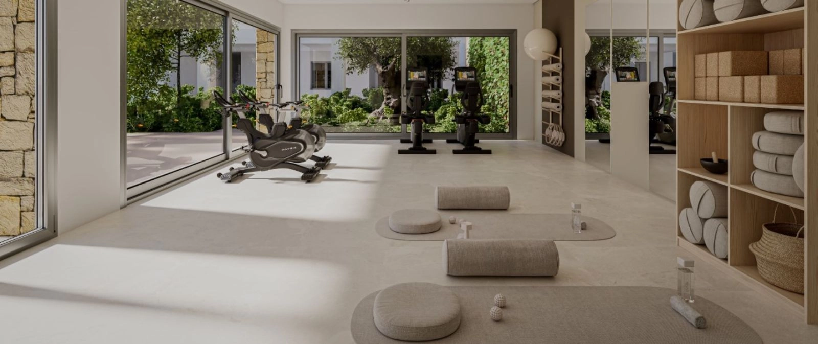 Een speciale fitnessruimte voor bewoners maakt een gezonde en actieve levensstijl mogelijk zonder het huis te verlaten.