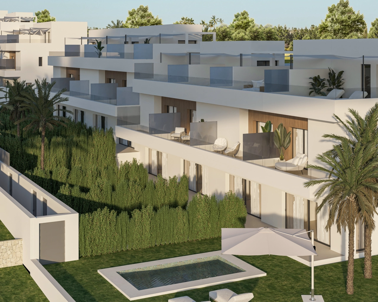 Een luchtfoto van het project, met de moderne architectuur en privétuinen.