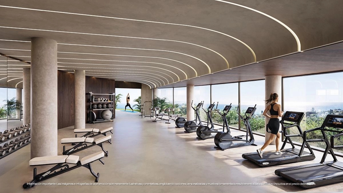 De ultramoderne fitnessruimte is volledig uitgerust en heeft grote ramen met inspirerende uitzichten om uw training te verbeteren.
