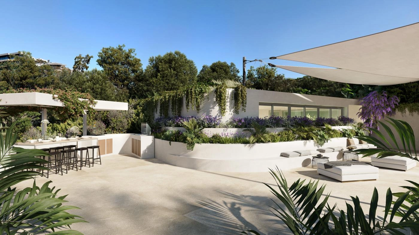 Een buitenlounge en keuken met barbecueplek, perfect voor sociale bijeenkomsten en dineren in de buitenlucht.