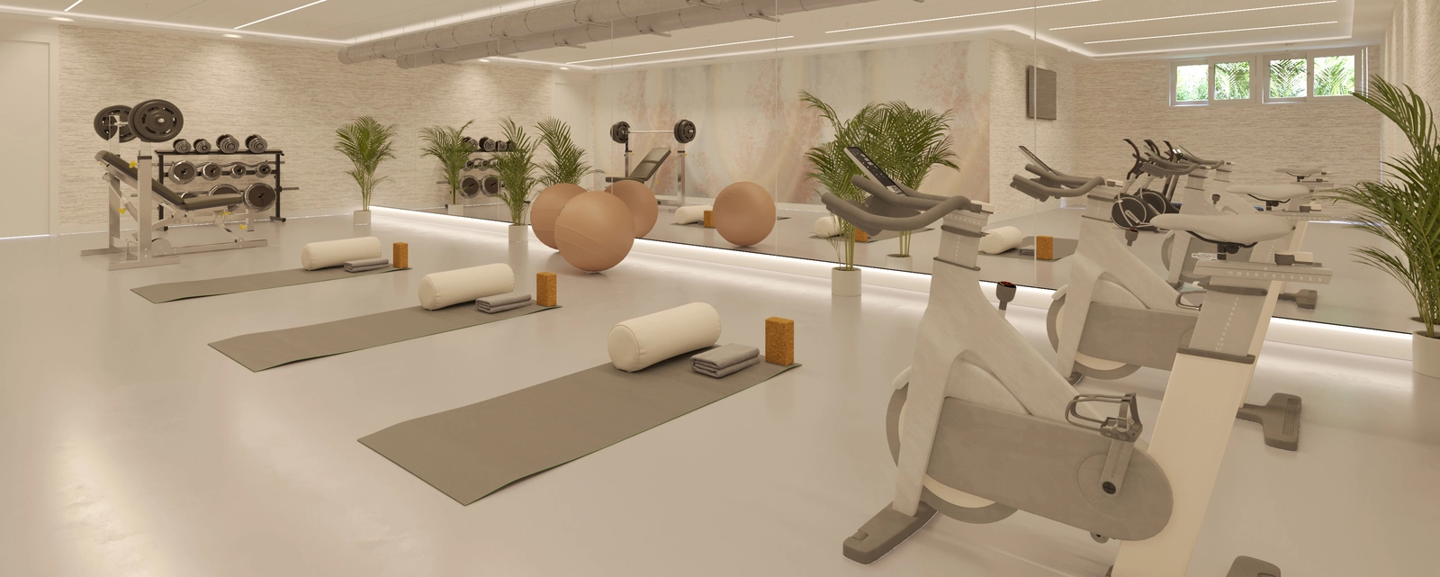 Een volledig uitgeruste fitnessruimte stelt bewoners in staat een gezonde levensstijl te handhaven zonder het huis te verlaten.