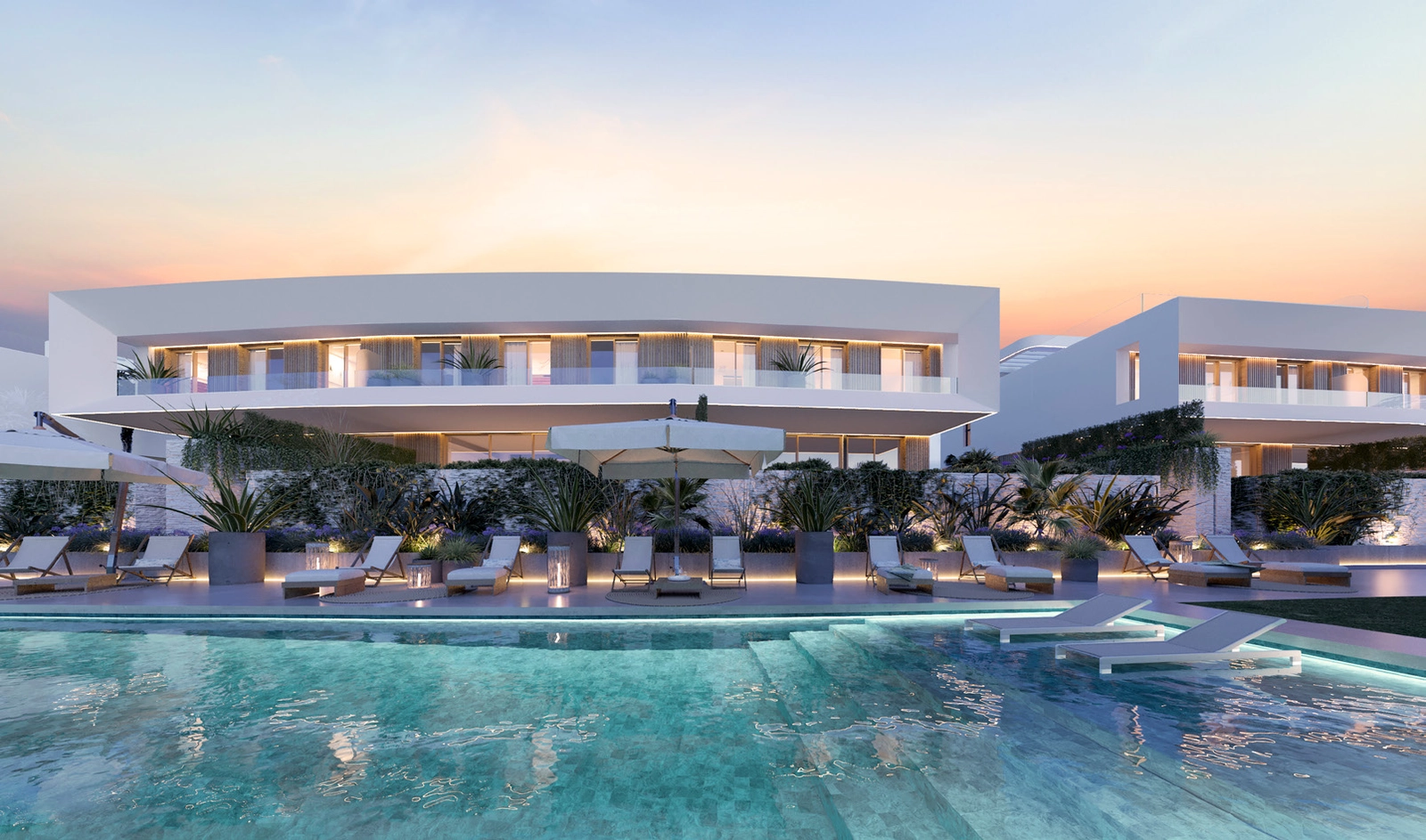 Het elegante gemeenschappelijke zwembadgedeelte, prachtig verlicht voor ontspanning in de avond.