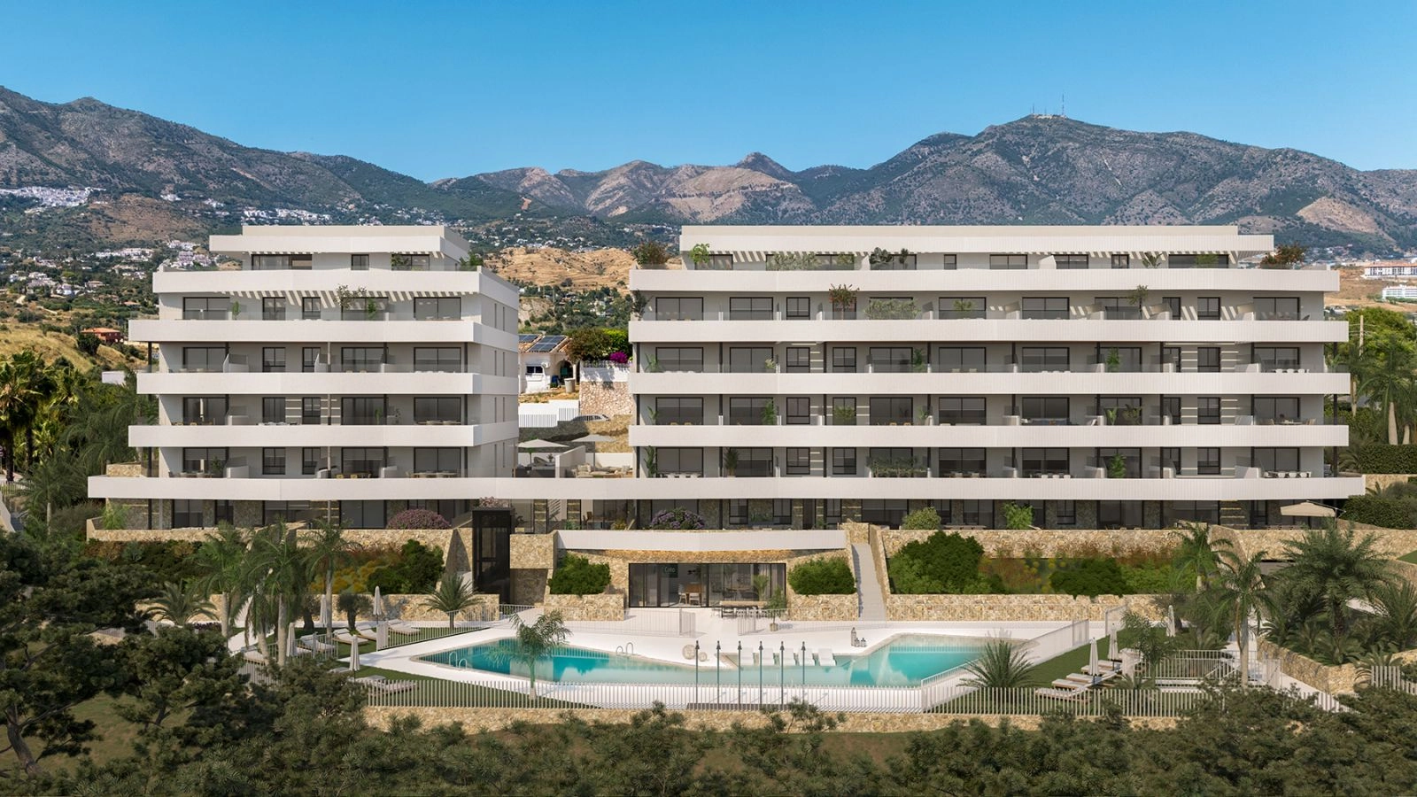 De elegante moderne gevel van de residentie, tegen de dramatische achtergrond van de Andalusische bergen.