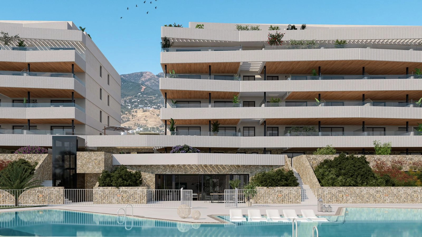 Een nadere blik op de eigentijdse architectonische details en de prachtige met steen beklede lagere niveaus bij het zwembad.