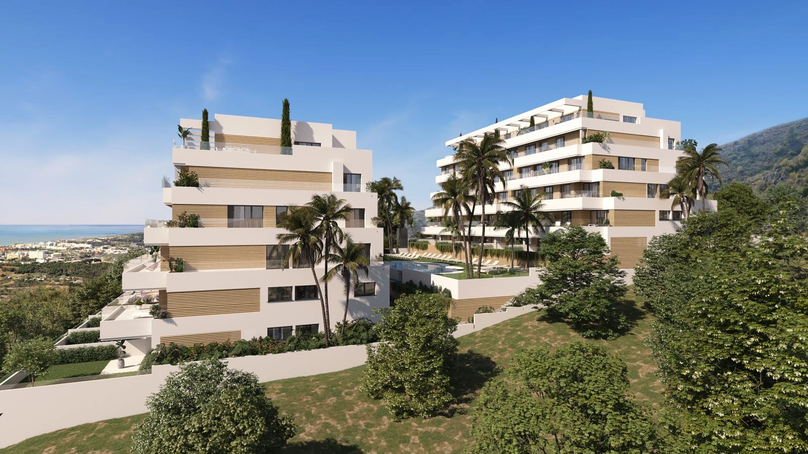 Een verhoogd uitzicht op het moderne wooncomplex, met zijn prachtige architectuur en uitzicht op de Middellandse Zee.