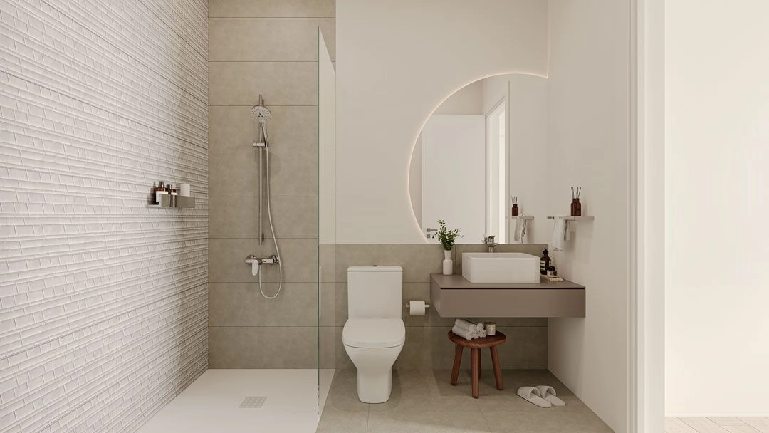 Een elegante badkamer met eigentijdse armaturen en hoogwaardige materialen voor een spa-achtige sfeer.