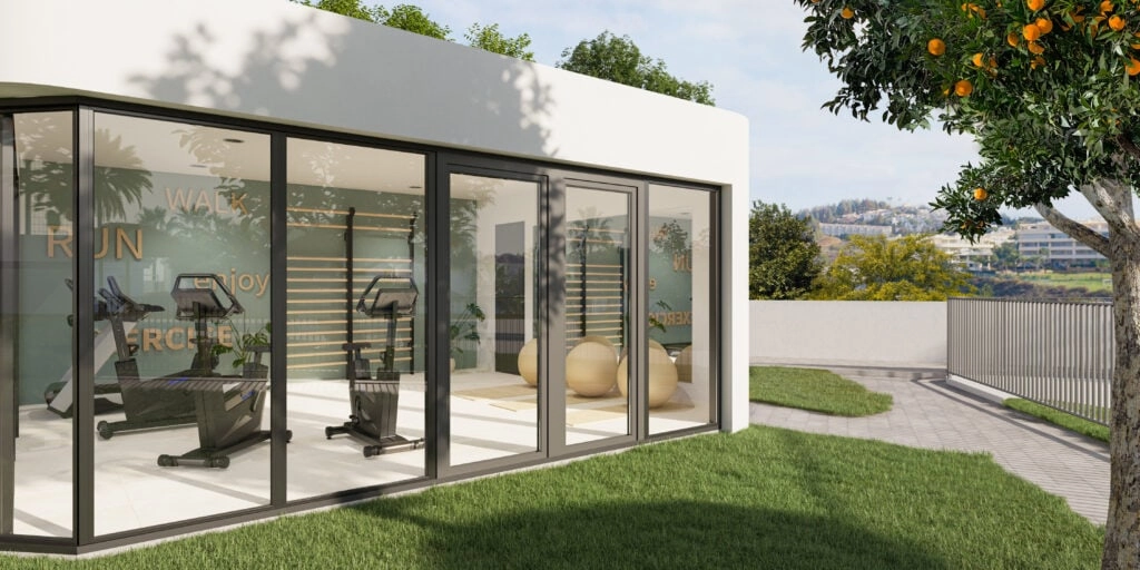 Handhaaf een gezonde levensstijl in de volledig uitgeruste, moderne fitnessruimte voor bewoners.