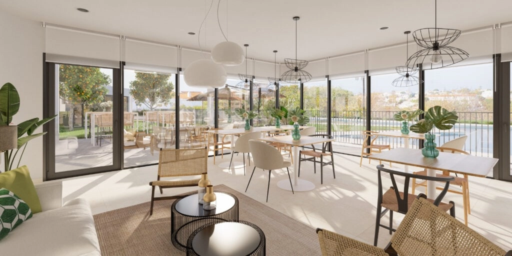 De sociale-gastronomische lounge is een elegante en comfortabele ruimte waar bewoners kunnen samenkomen, werken of feesten met vrienden en familie.