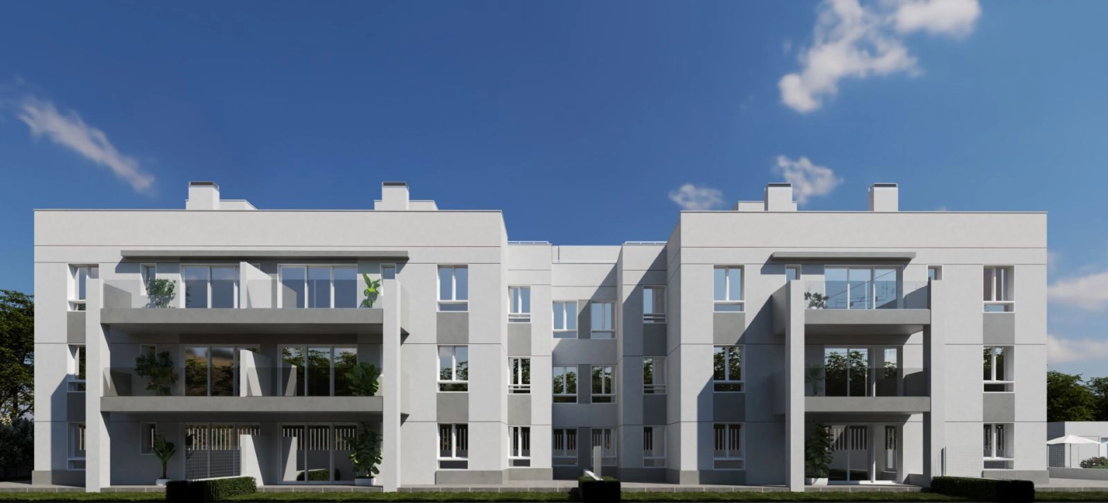 De moderne architectuur van het gebouw past harmonieus in de groene omgeving.