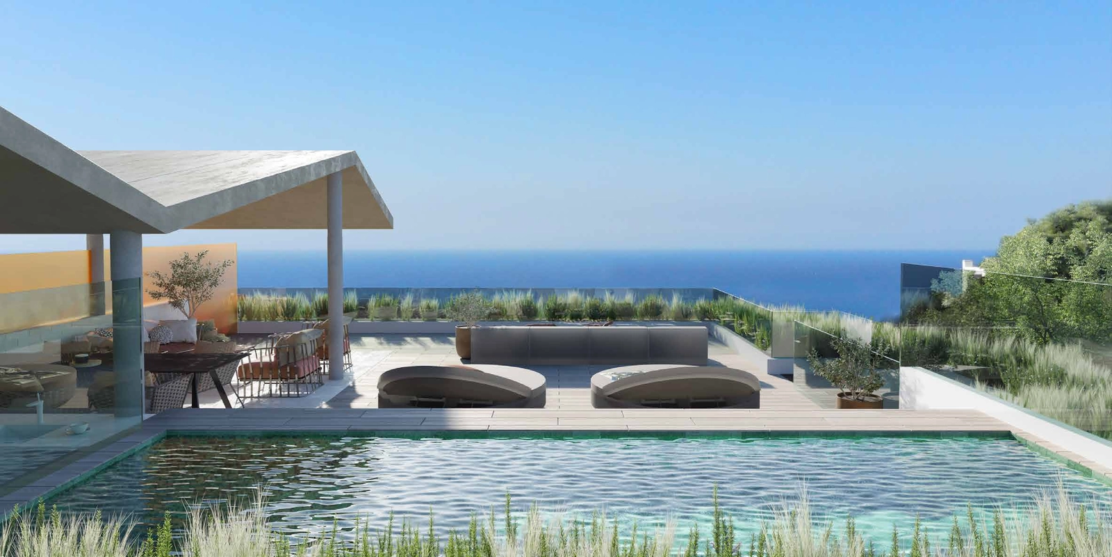 Het solarium van het penthouse biedt een perfecte setting voor entertainment met panoramisch uitzicht op zee.