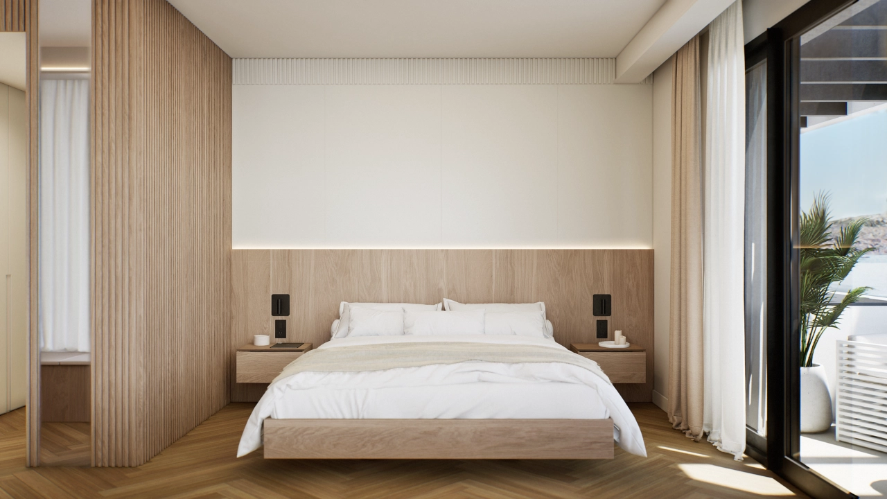 De serene hoofdslaapkamer is een vredig toevluchtsoord met veel natuurlijk licht.