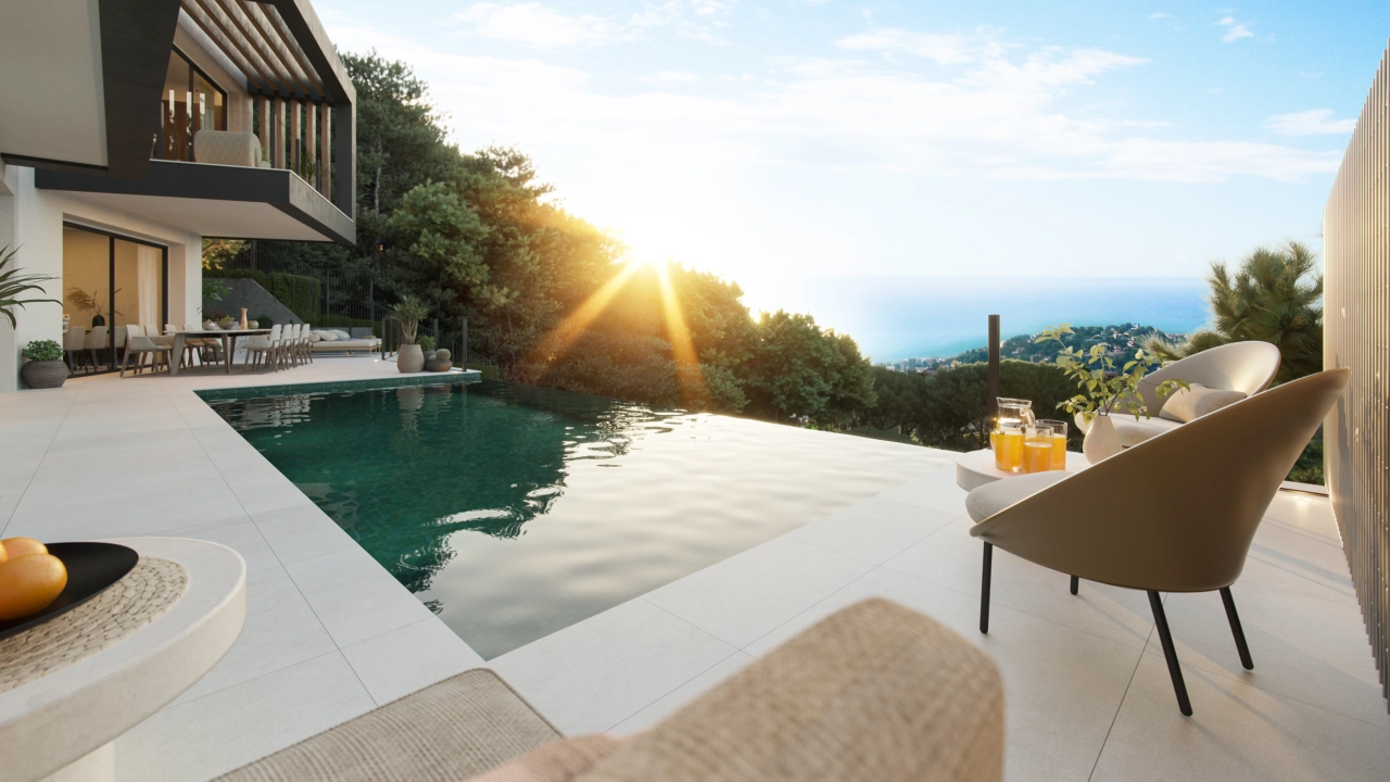 Ontspan bij het zwembad en zie de zon ondergaan boven de prachtige heuvels van Málaga.