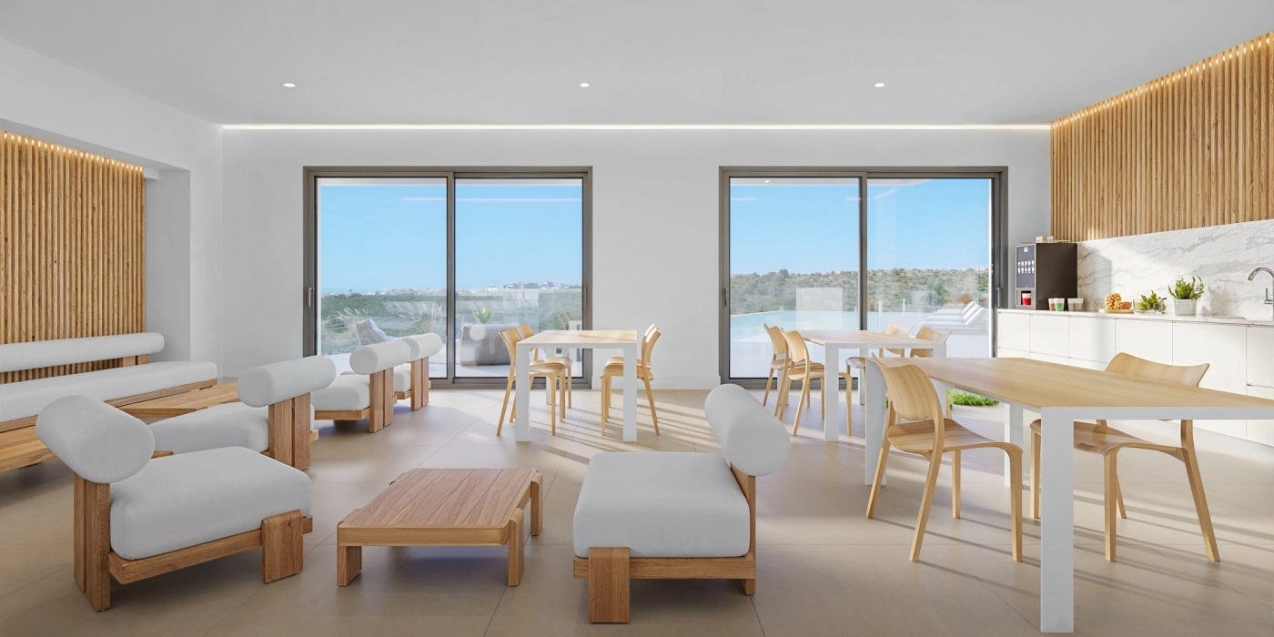 Een comfortabele co-workingruimte voor bewoners om te werken of te ontspannen in een rustige en professionele omgeving.