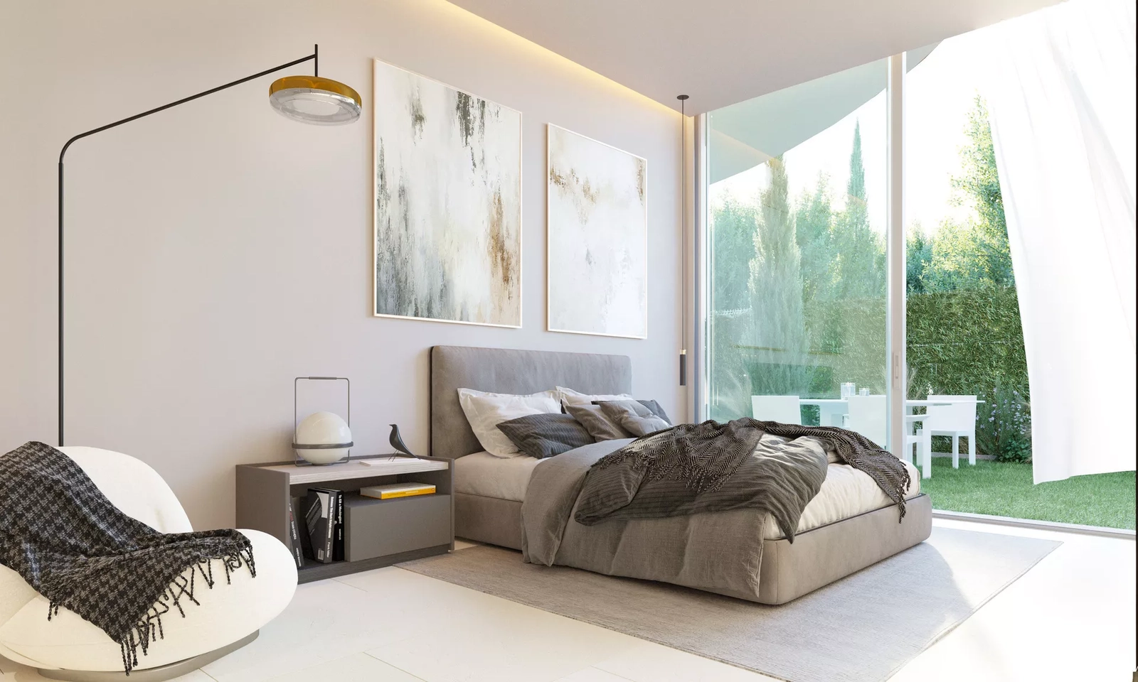 Een comfortabele slaapkamer met grote glazen schuifdeuren die direct uitkomen op de mediterrane tuin.