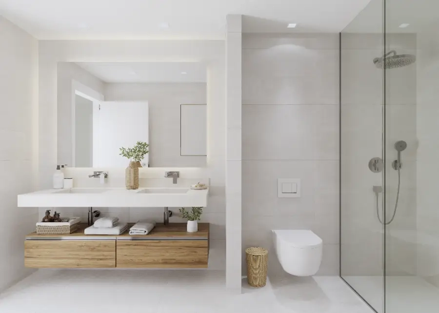 Een stijlvolle hoofdbadkamer met hoogwaardige afwerkingen, dubbele wastafel en een ruime inloopdouche.