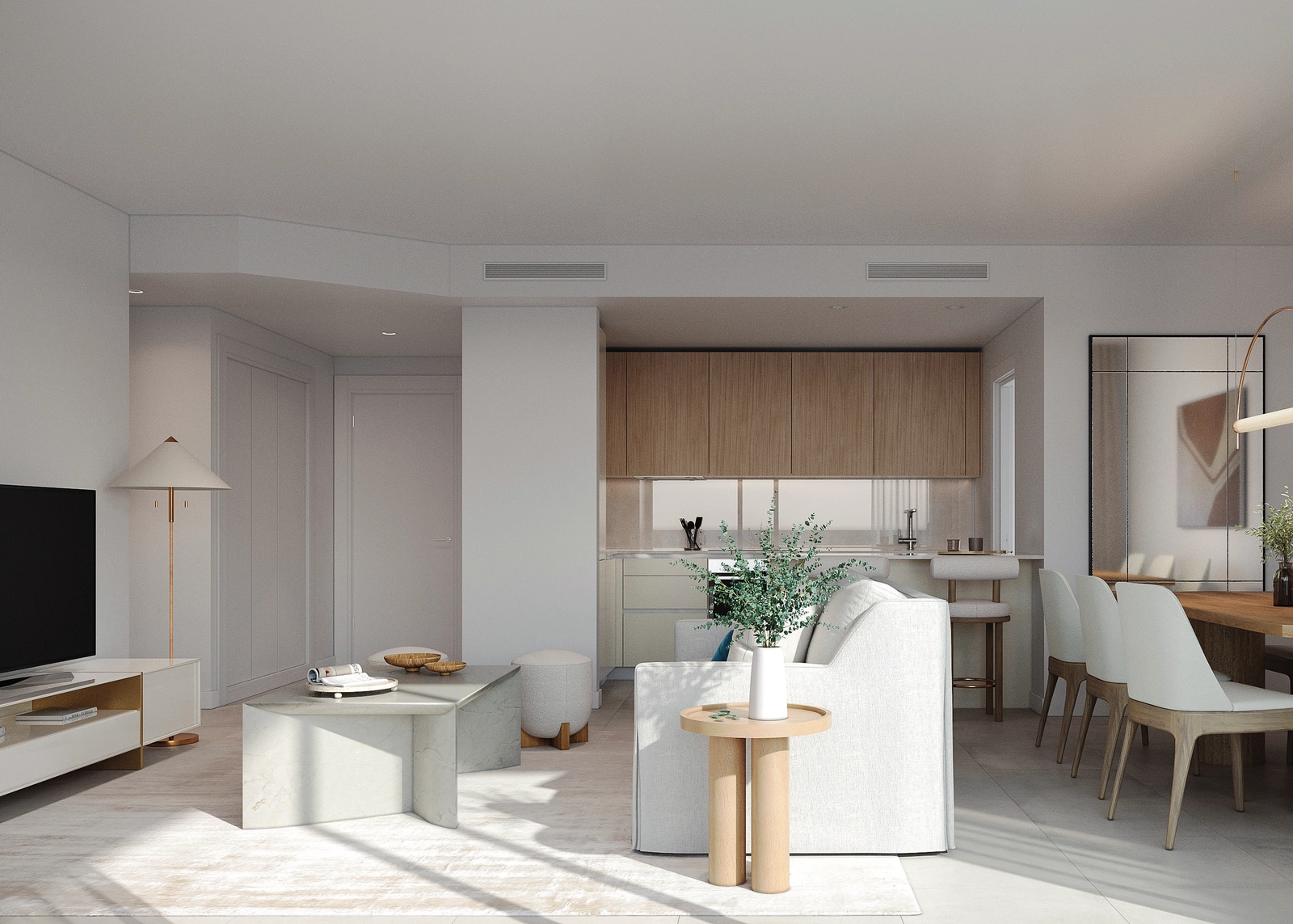 Lichte en open woonruimtes die naadloos in elkaar overlopen, gevuld met natuurlijk licht.