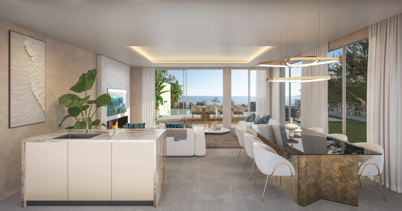 Een open woonruimte die naadloos aansluit op buiten en de zee.