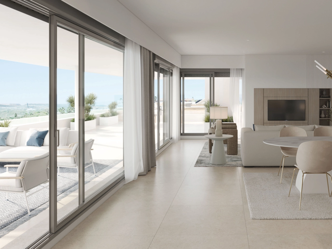 Een lichte en ruime woonkamer, naadloos verbonden met het buitenterras.