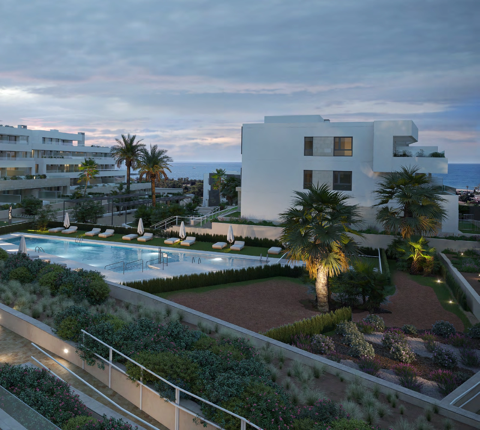 Naarmate de avond valt, creëert het verlichtingsontwerp van de ontwikkeling een warme en exclusieve ambiance.